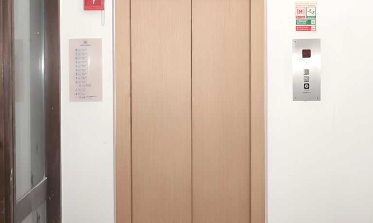 Covering porte ascenseur - Next Vosges