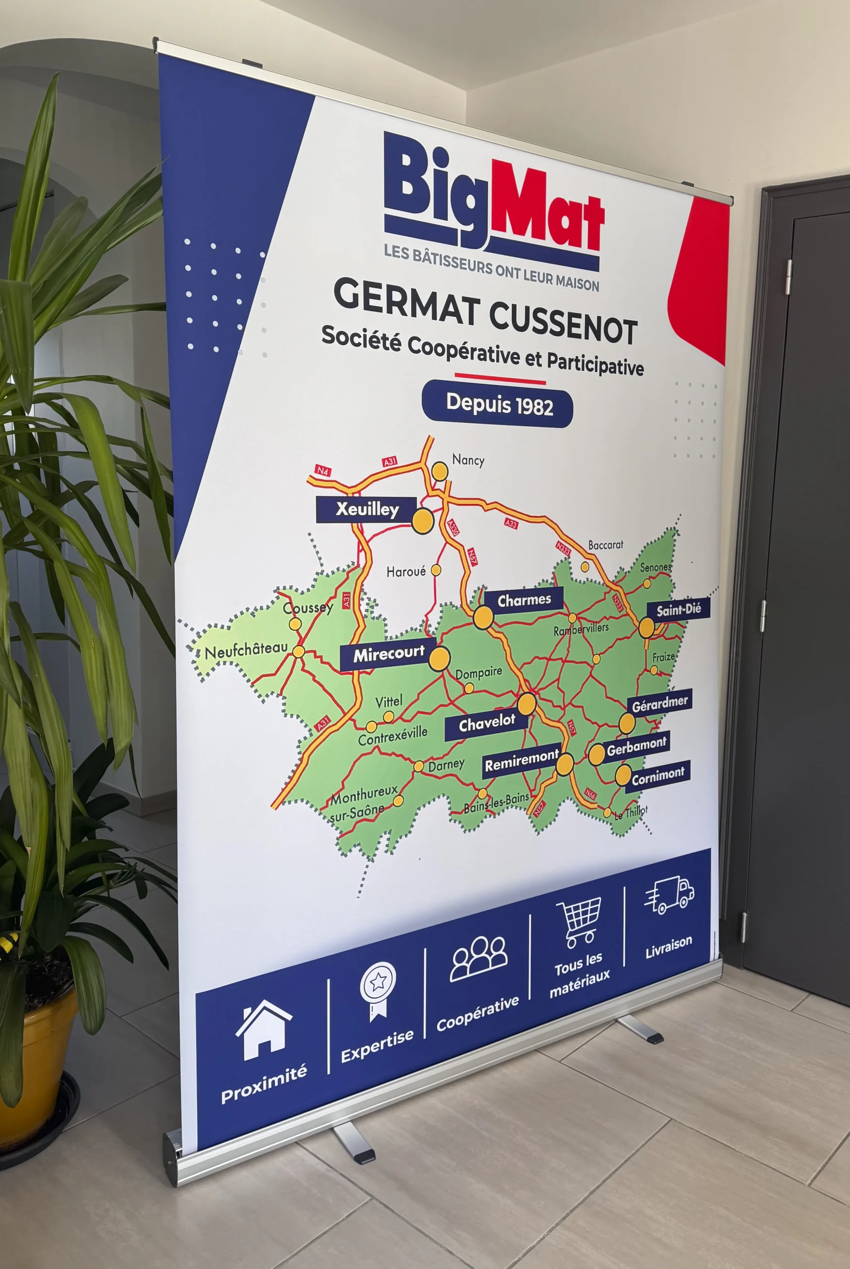 Roll-up grand format sur mesure réalisé par l'agence Next pour BigMat Germat Cussenot dans les Vosges